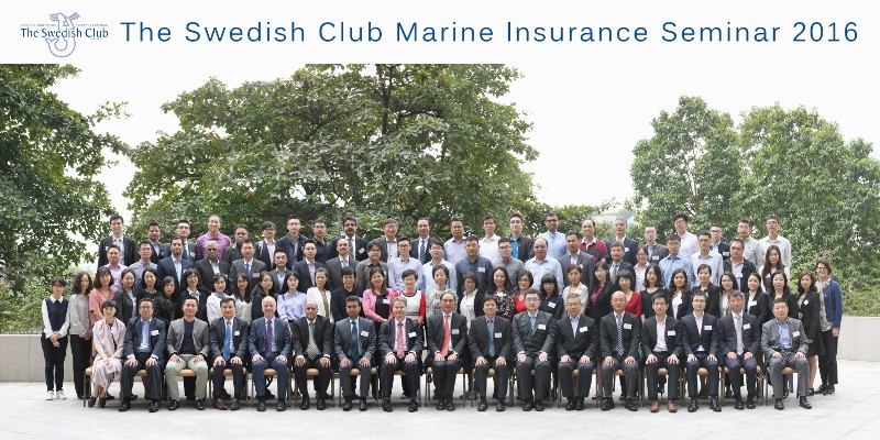 Participants, speakers and organisers of the Marine Insurance Seminar in Zhauhai, China pose for a group photo.